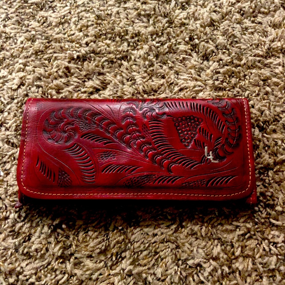 Leader in Leather red tooled Tri fold wallet.